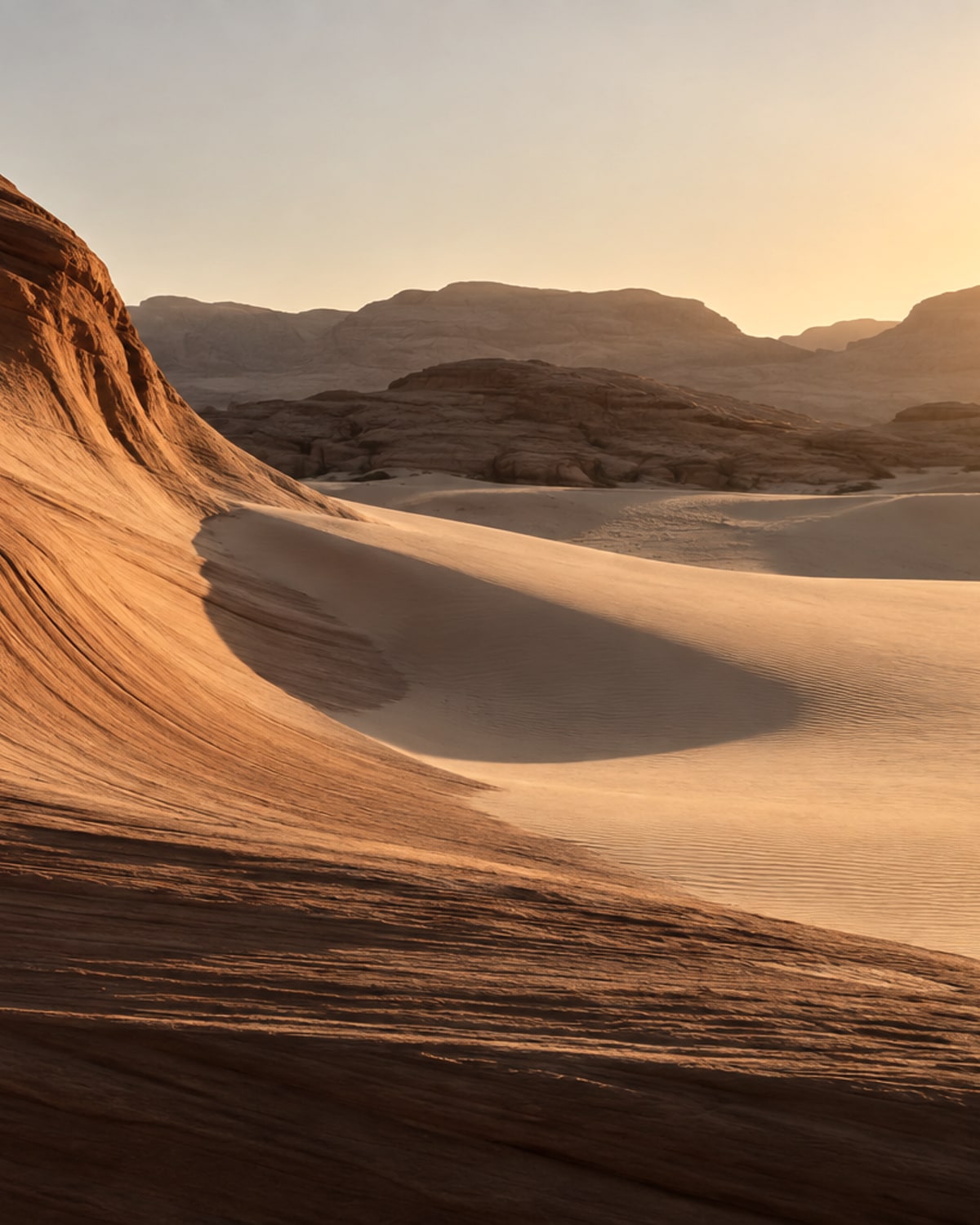 Low sun on a sandstone desert ridge in the frames colour grade.